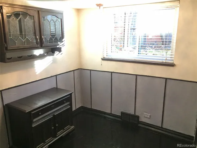 a view of hallway with a bathroom