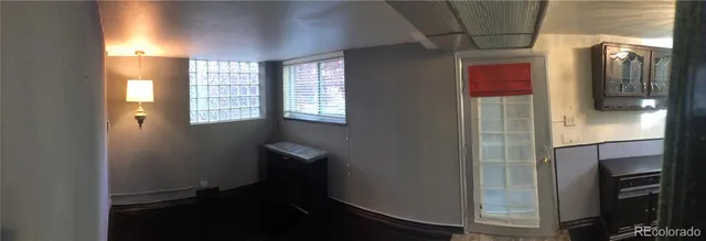 a bathroom with a mirror and a shower