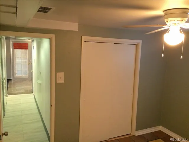 a view of a room with a window