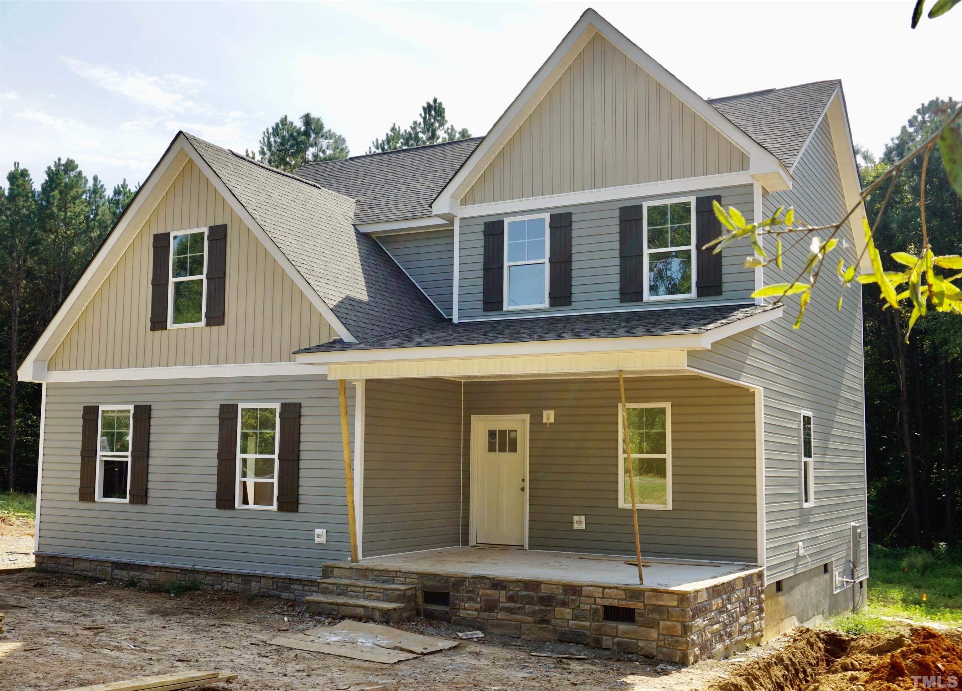 832 Mulberry Road Spring Hope, NC 27882 - Photo 1 of 26 a view of a house with a yard
