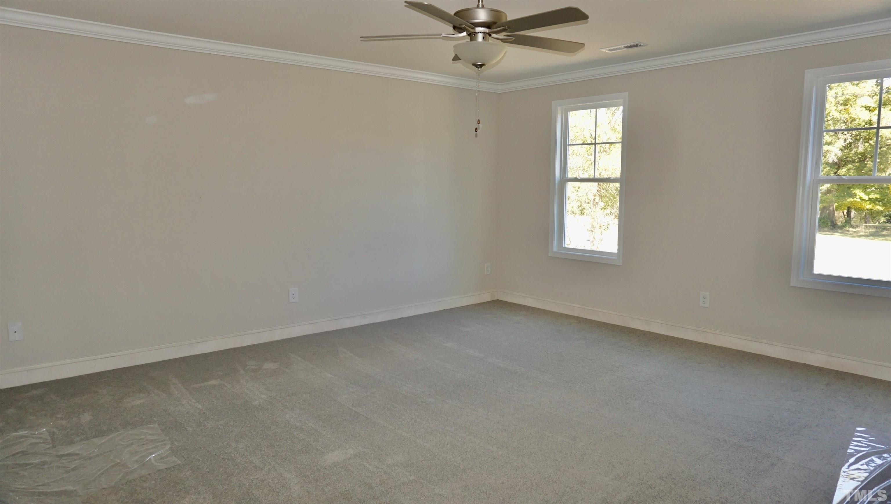 832 Mulberry Road Spring Hope, NC 27882 - Photo 18 of 26 an empty room with a window
