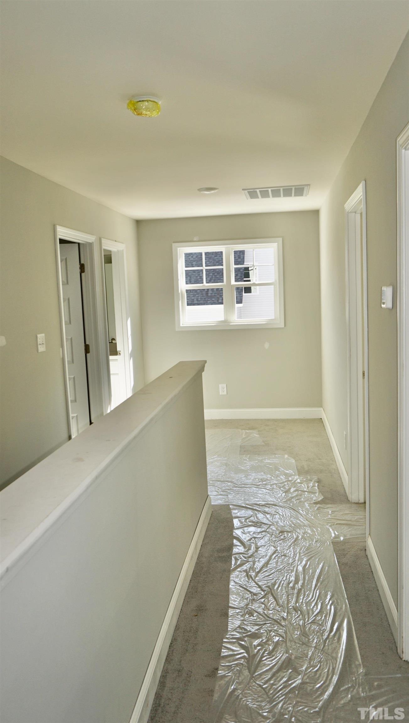 832 Mulberry Road Spring Hope, NC 27882 - Photo 24 of 26 a view of hallway with wooden floor