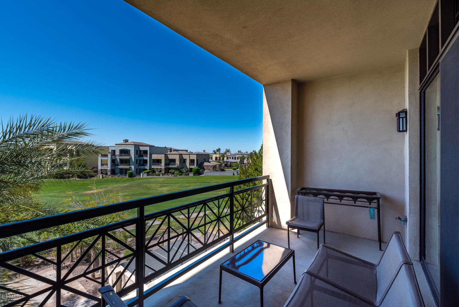 8 Biltmore Estate, Unit 302 Phoenix, AZ 85016 - Photo 14 of 21 a view of a chairs and table on the balcony