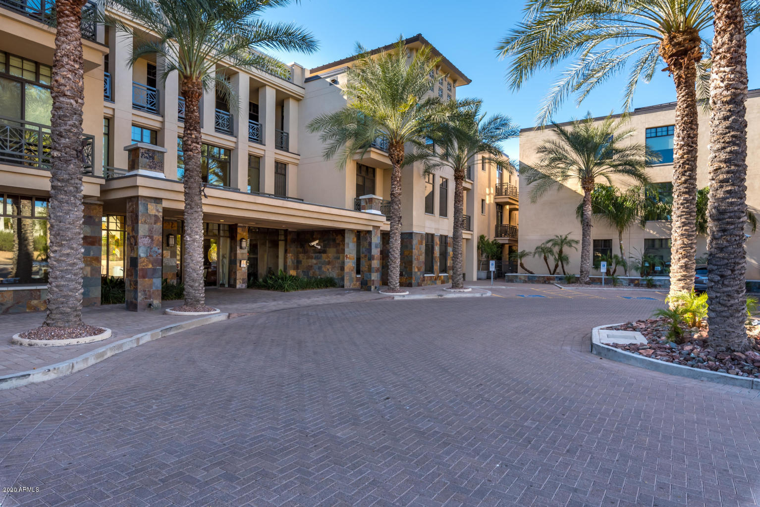 8 Biltmore Estate, Unit 302 Phoenix, AZ 85016 - Photo 20 of 21 a view of a street with a building in the background