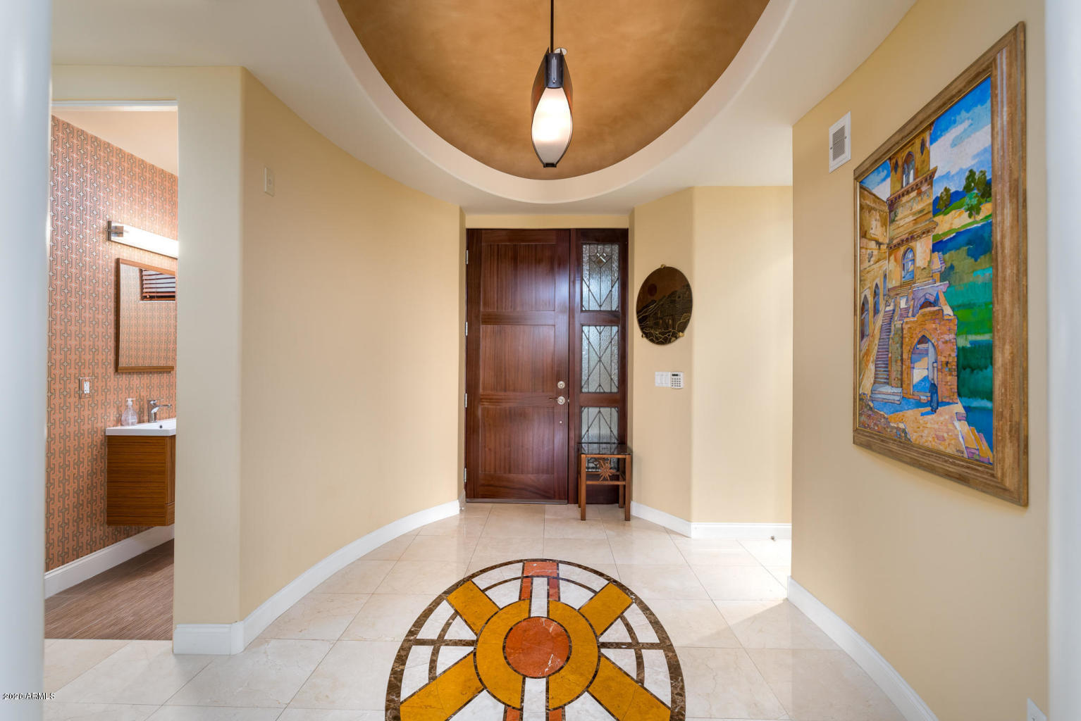 8 Biltmore Estate, Unit 302 Phoenix, AZ 85016 - Photo 3 of 21 a view of a hallway with entryway wooden floor and front door