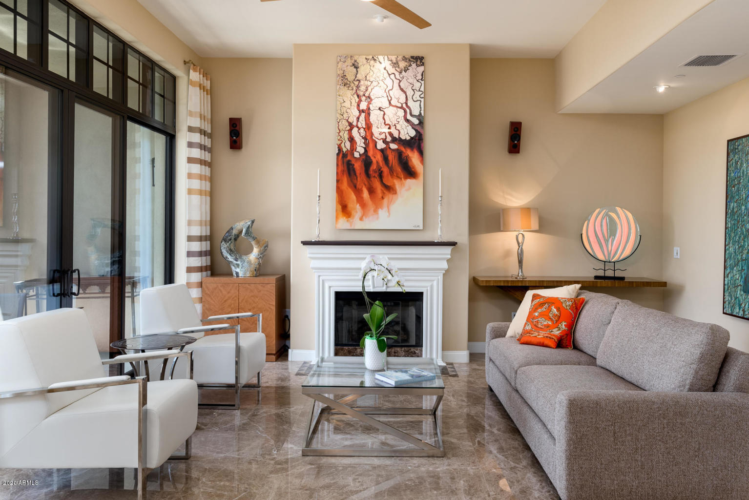 8 Biltmore Estate, Unit 302 Phoenix, AZ 85016 - Photo 8 of 21 a living room with furniture fireplace and a large window