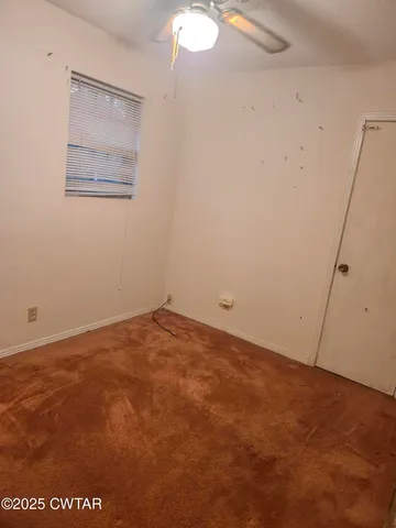 an empty room with a workbench