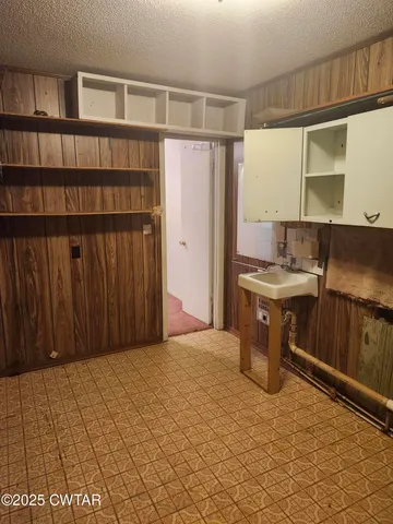 a room with furniture and a book shelf