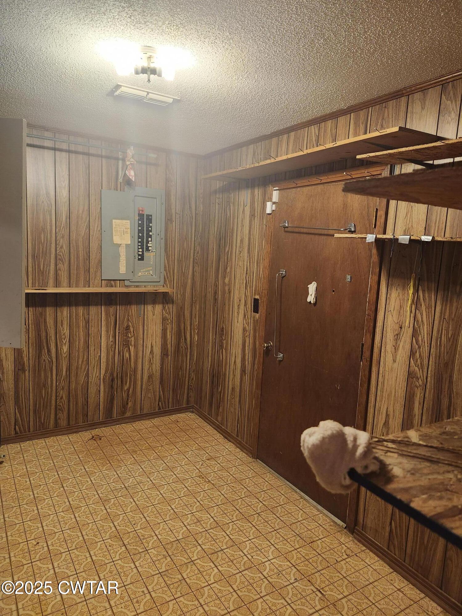 705 George Street Trenton, TN 38382 - Photo 15 of 15 a bedroom with a bed and a mirror