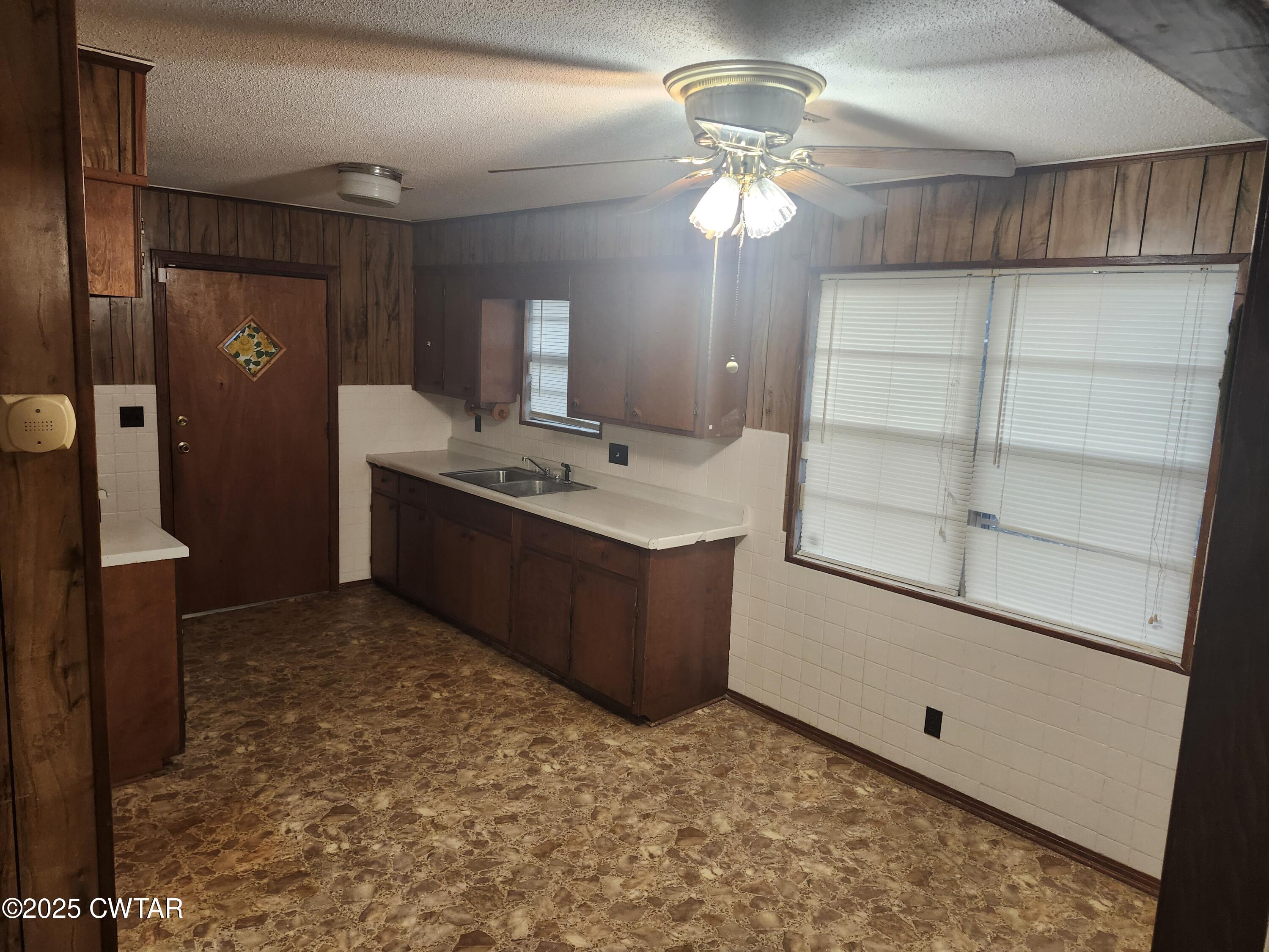 705 George Street Trenton, TN 38382 - Photo 9 of 15 a room with closet and chandelier