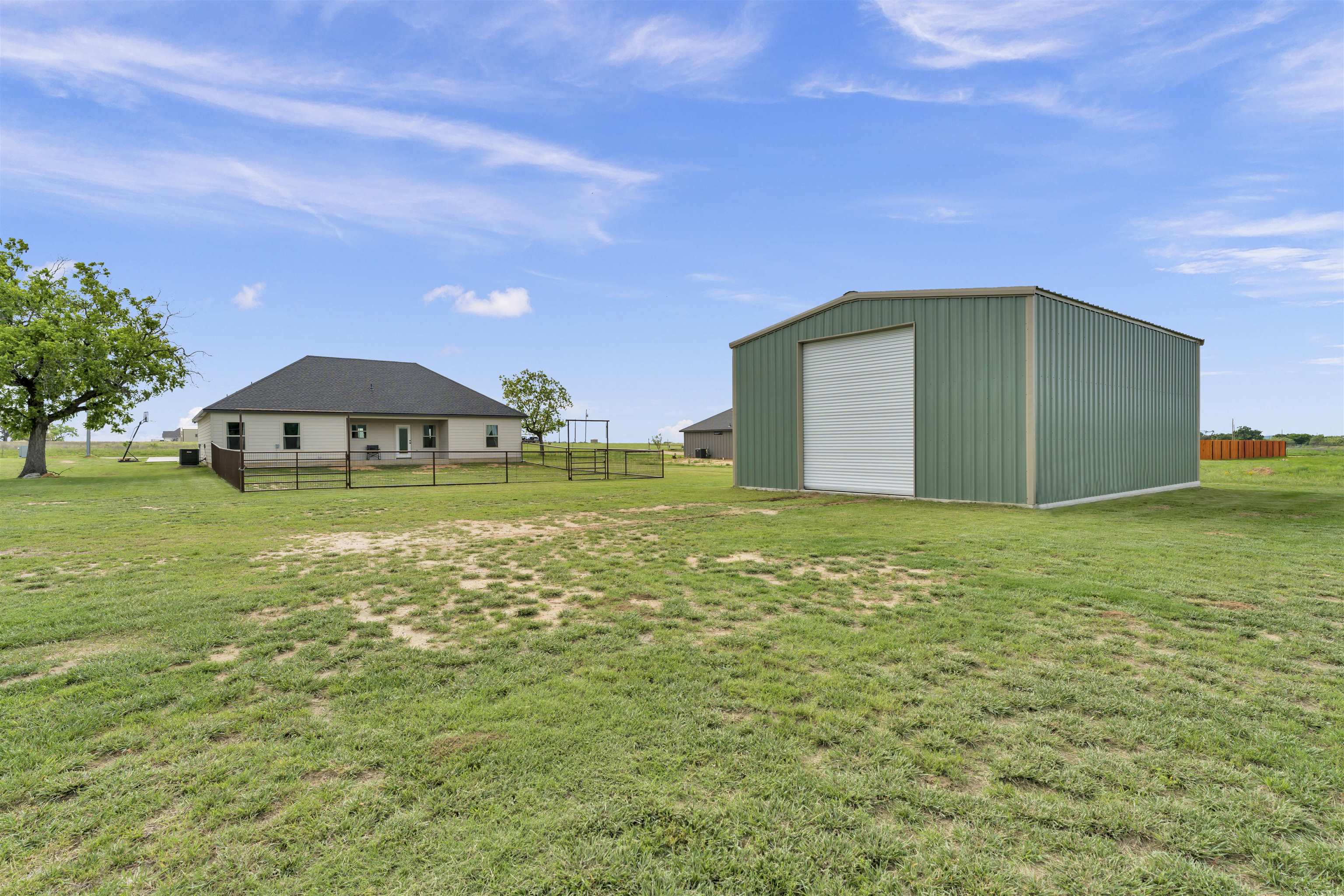 494 Johnson Road Mason, TX 76856 - Photo 25 of 28 a backyard of a house with lots of green space