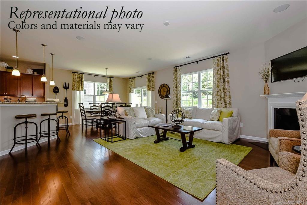 79169 Ridgehaven Road, Unit 152 Lancaster, SC 29720 - Photo 2 of 9 a living room with furniture and a flat screen tv