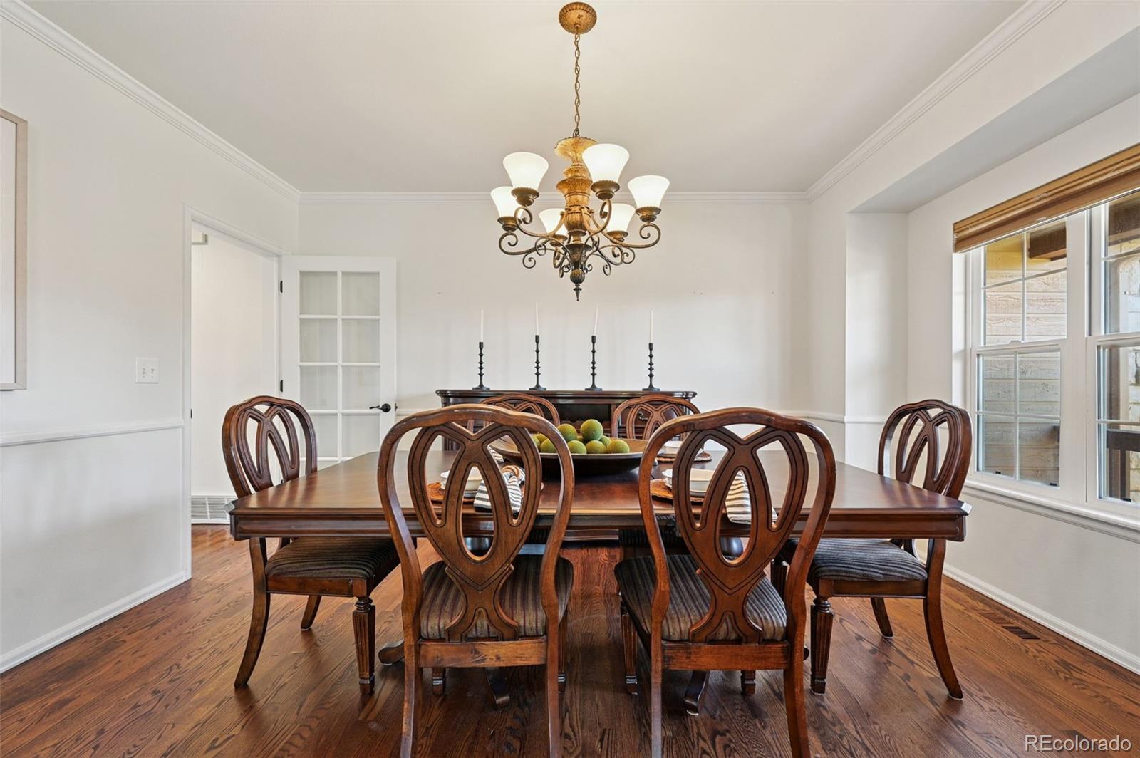 5575 Butler Court Colorado Springs, CO 80918 - Photo 18 of 47 a view of a dining room furniture and wooden floor