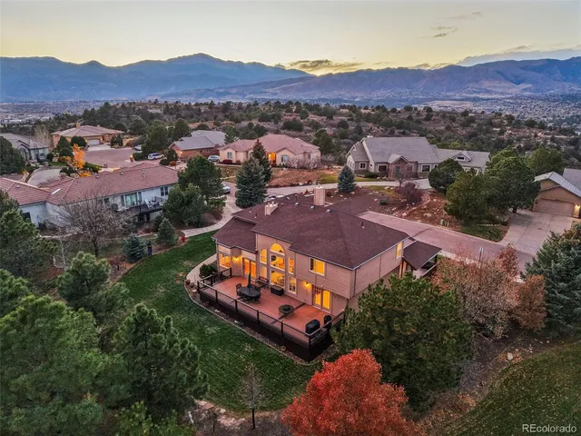 an aerial view of a house with a garden