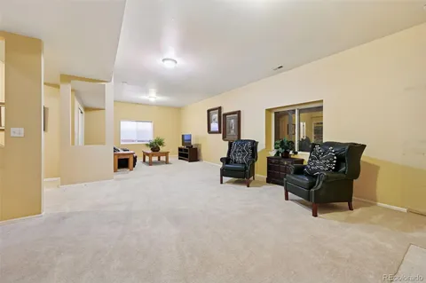 a view of a livingroom with furniture and a couch