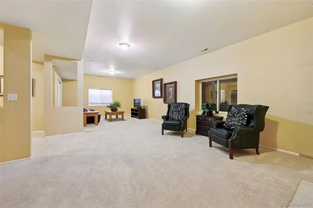 a view of a livingroom with furniture and a couch