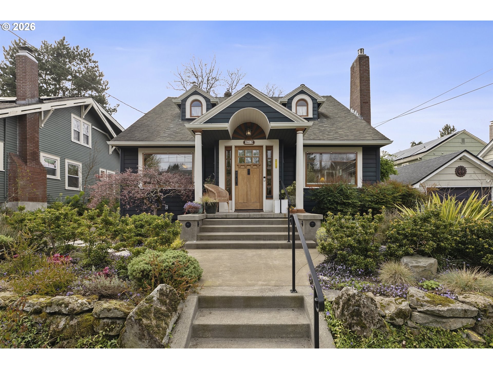 3613 Northeast 24th Avenue Portland, OR 97212 - Photo 1 of 48 a front view of a house with garden
