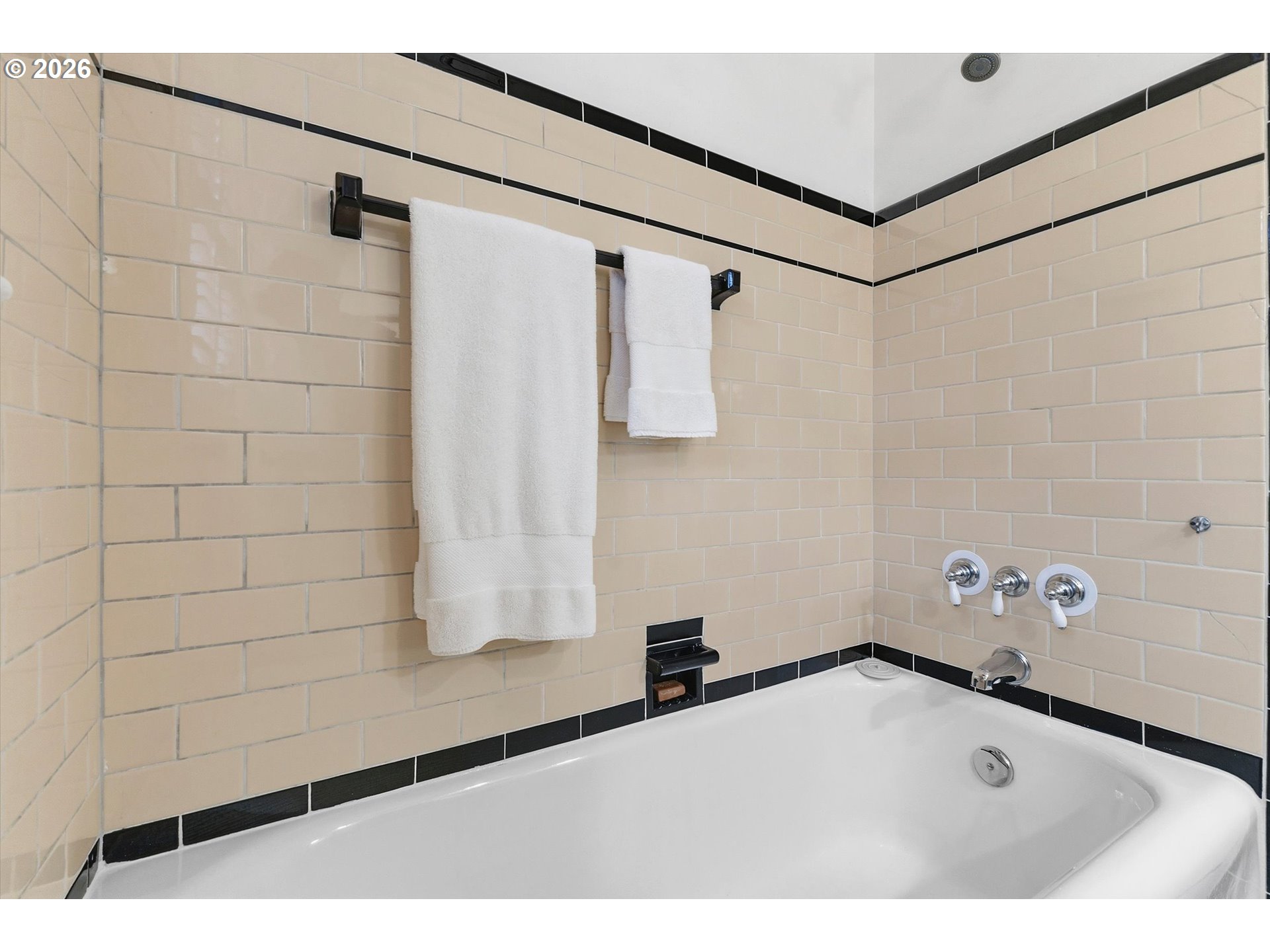 3613 Northeast 24th Avenue Portland, OR 97212 - Photo 15 of 48 a bathroom with a bathtub and a shower