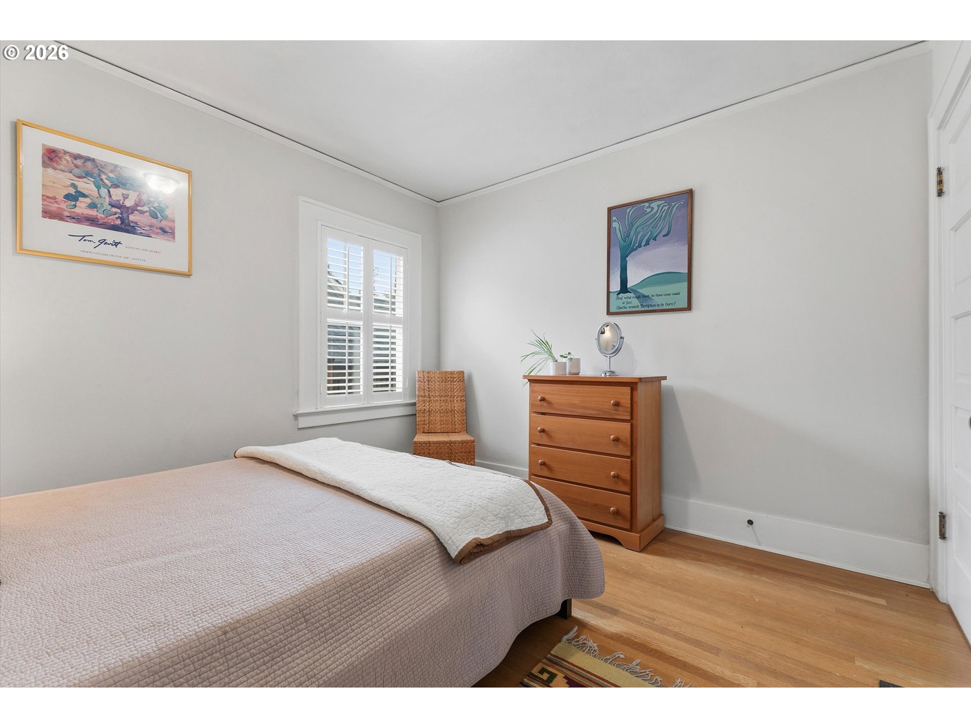 3613 Northeast 24th Avenue Portland, OR 97212 - Photo 20 of 48 a bedroom with a bed and wooden floor