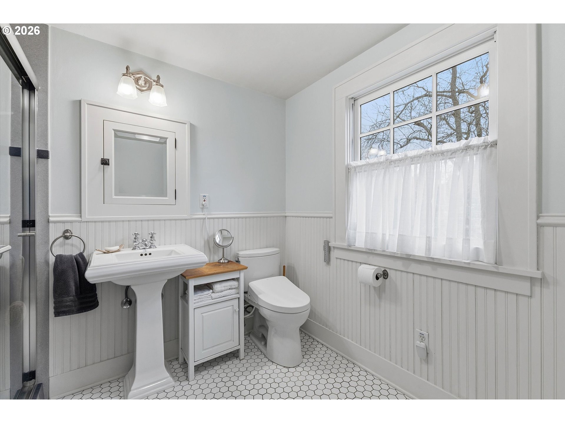 3613 Northeast 24th Avenue Portland, OR 97212 - Photo 24 of 48 a bathroom with a sink toilet and mirror