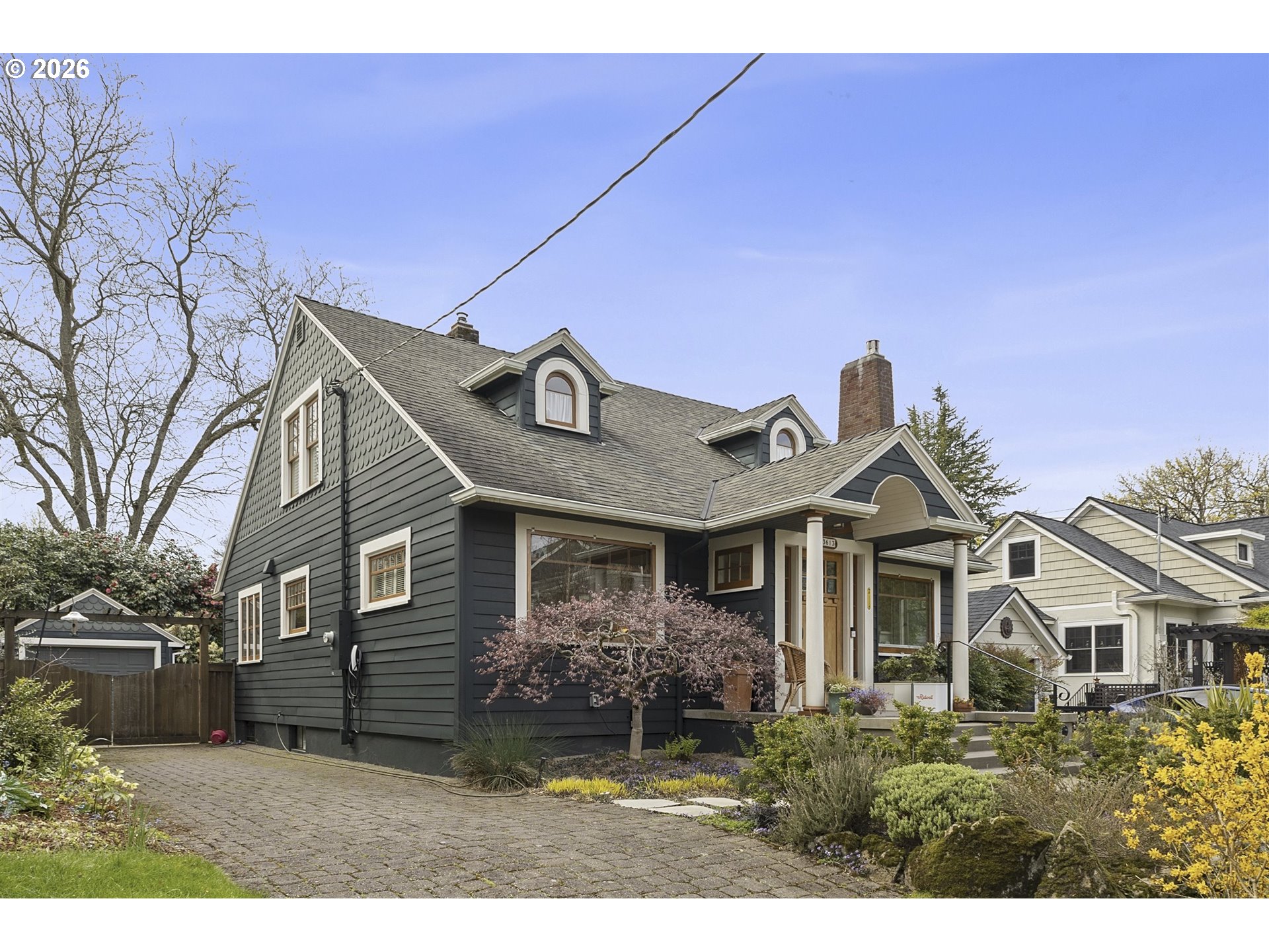 3613 Northeast 24th Avenue Portland, OR 97212 - Photo 35 of 48 a front view of a house with a garden