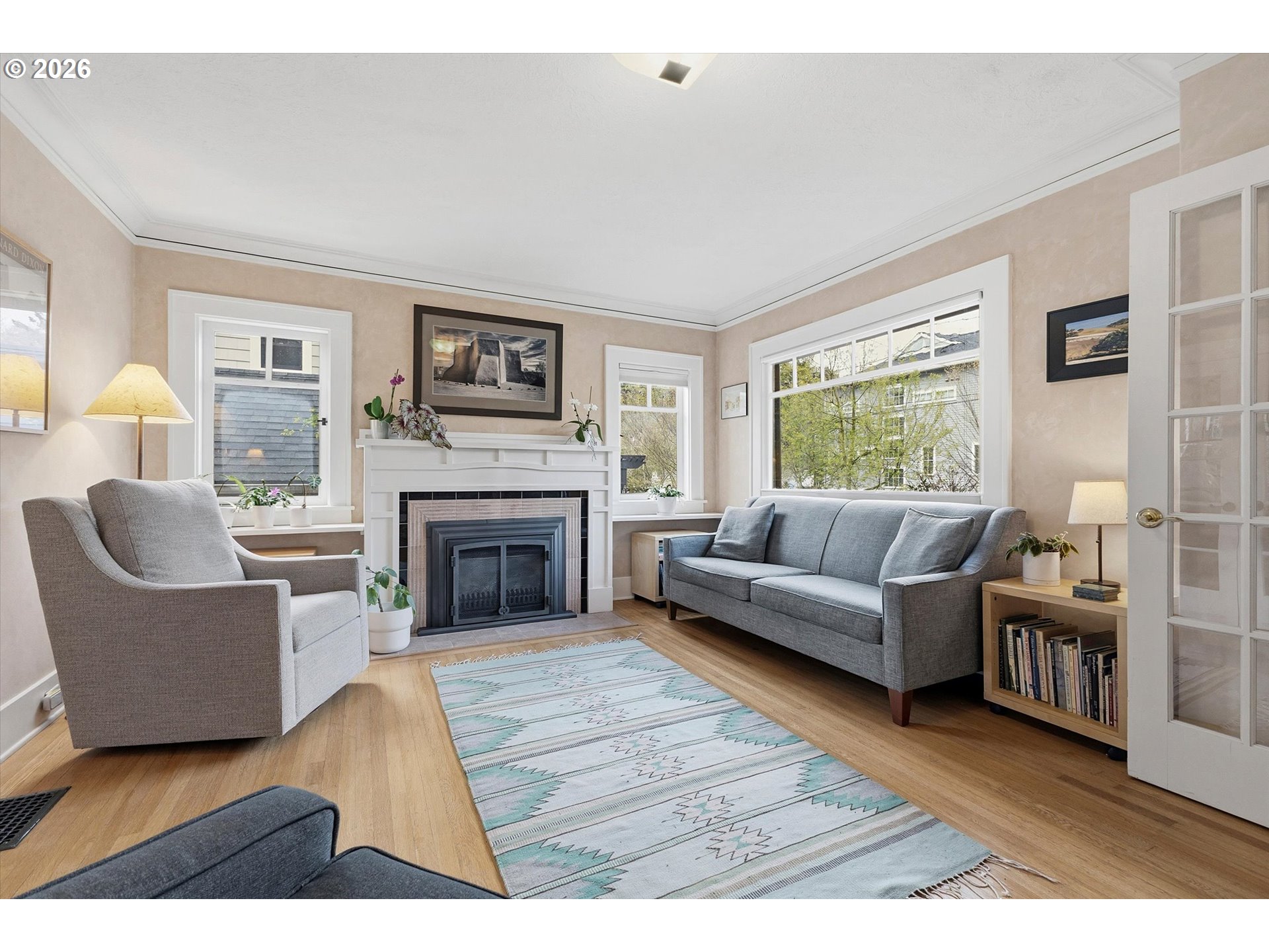 3613 Northeast 24th Avenue Portland, OR 97212 - Photo 6 of 48 a living room with furniture and a fireplace