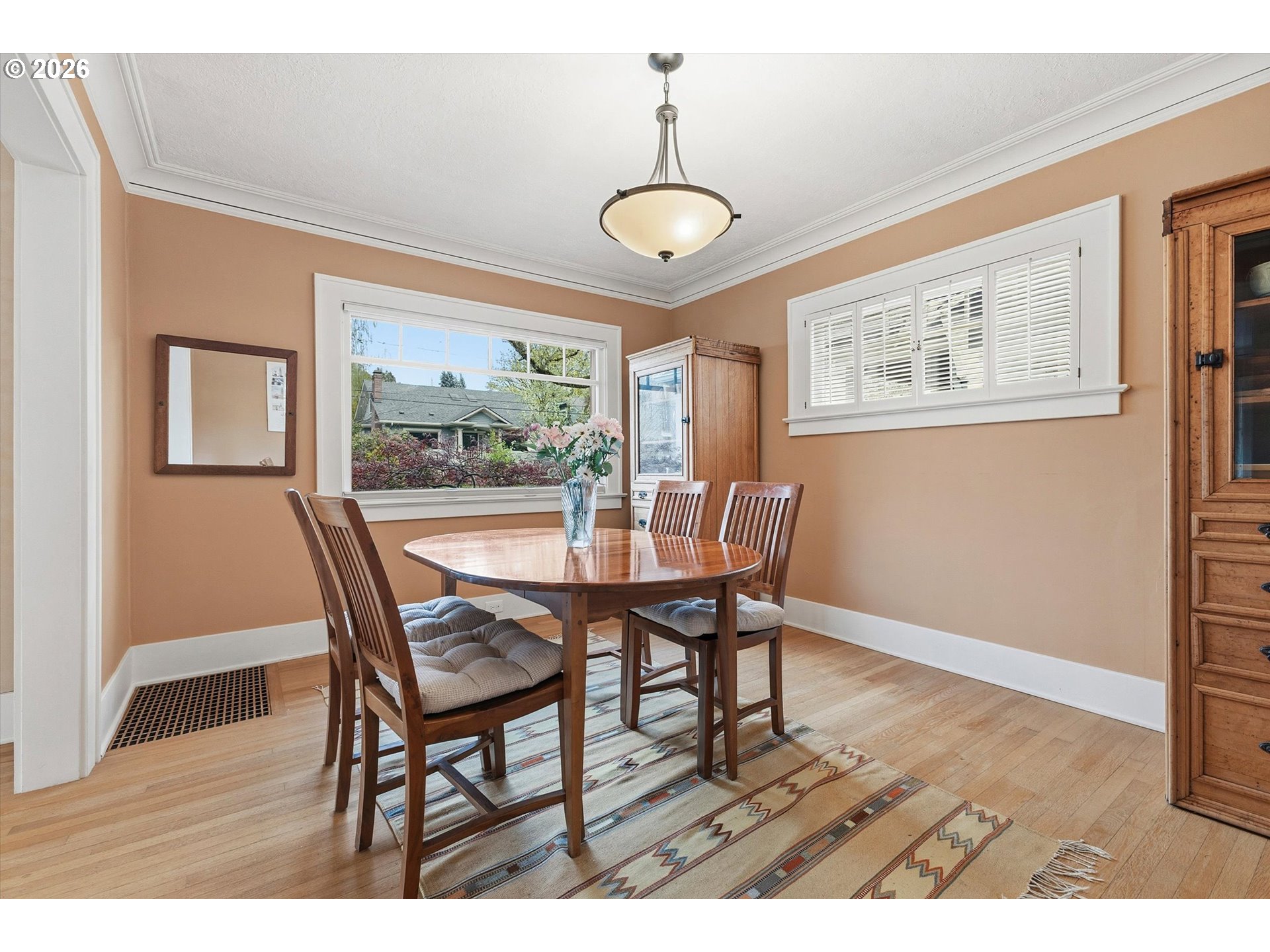 3613 Northeast 24th Avenue Portland, OR 97212 - Photo 7 of 48 a view of a dining room with furniture window and wooden floor