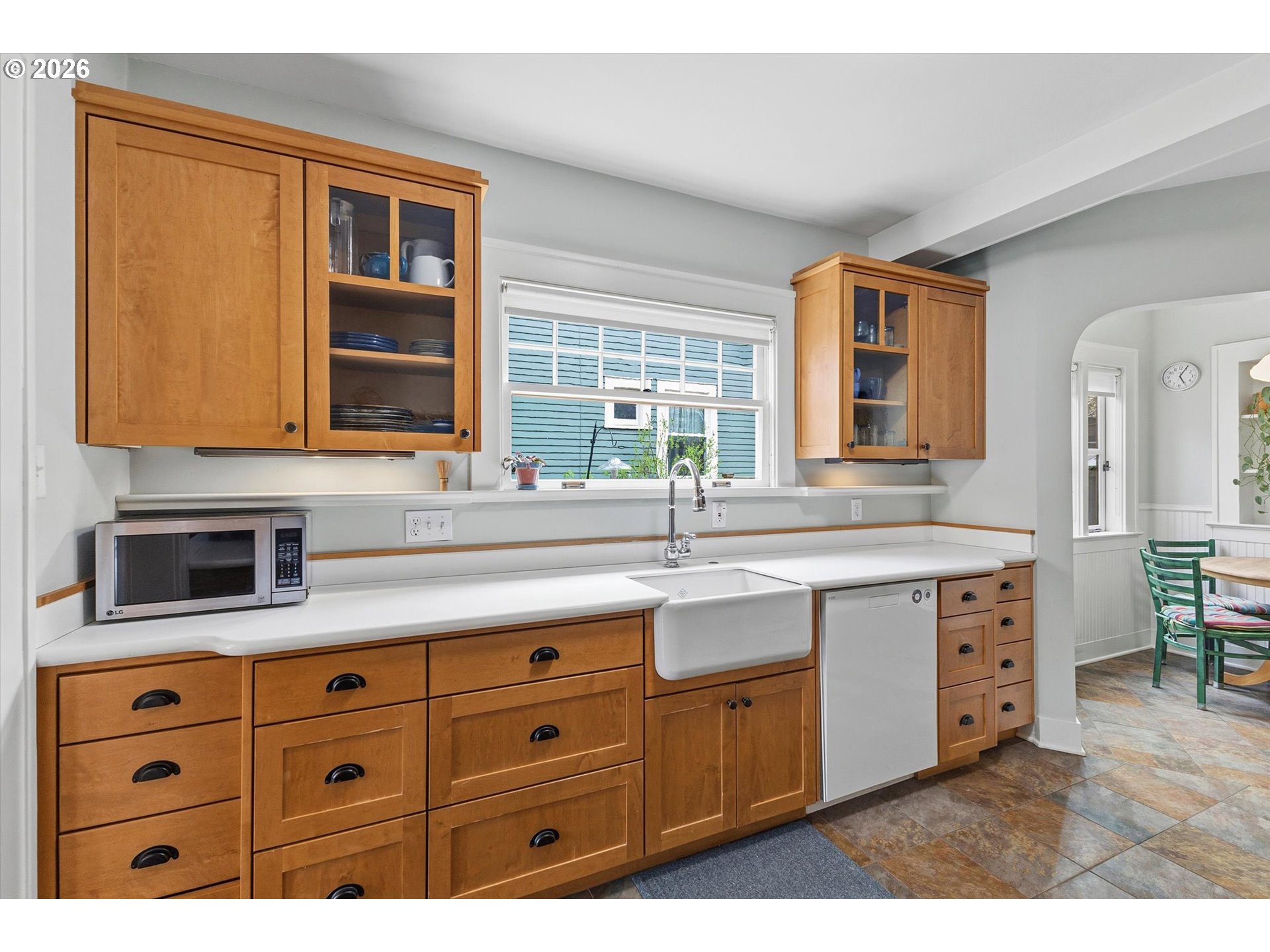 3613 Northeast 24th Avenue Portland, OR 97212 - Photo 9 of 48 a kitchen with cabinets appliances and a window