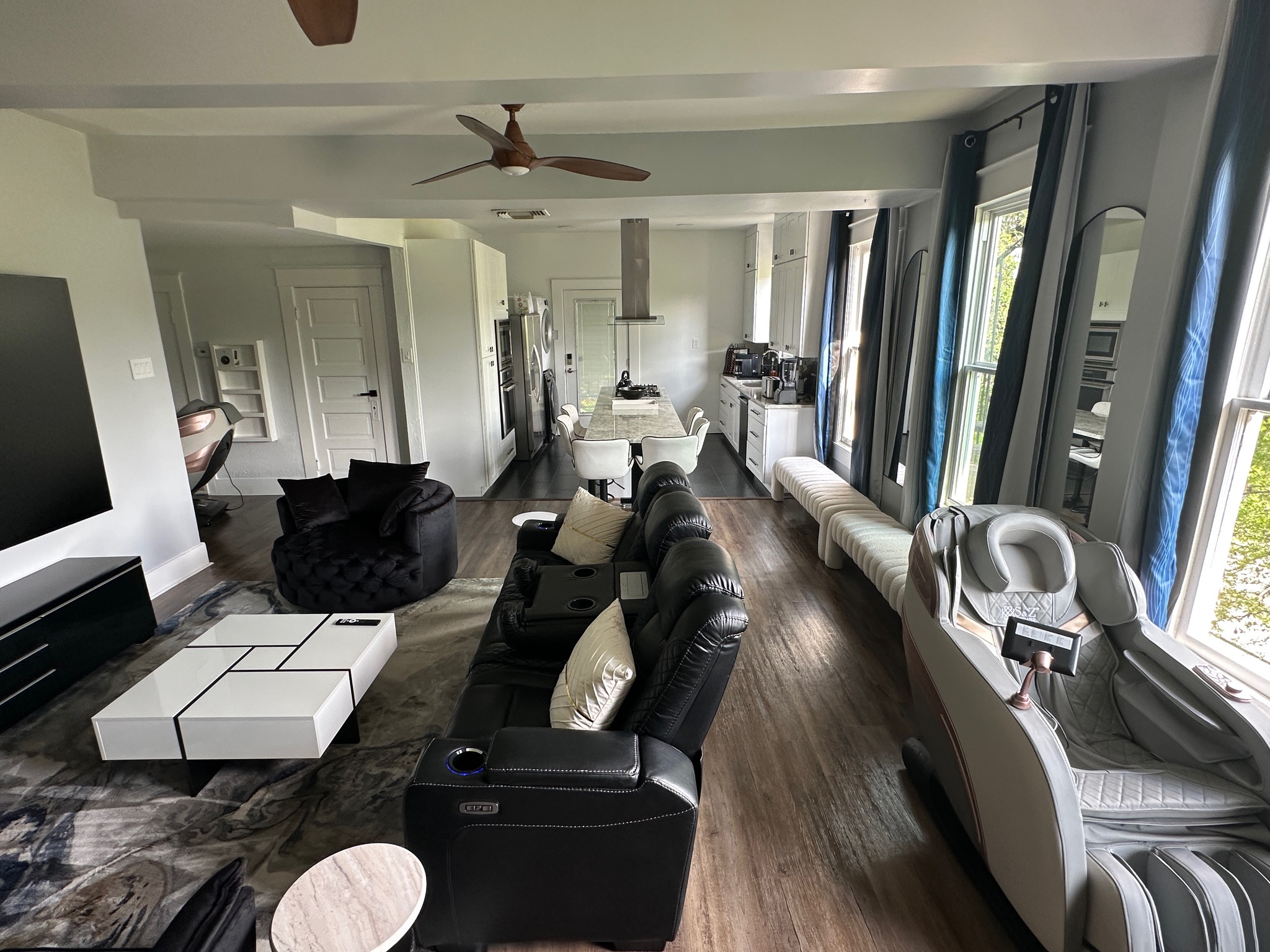 3210 Hampton Road, Unit A B C Austin, TX 78705 - Photo 22 of 42 Living area featuring dark wood finished floors and a ceiling fan