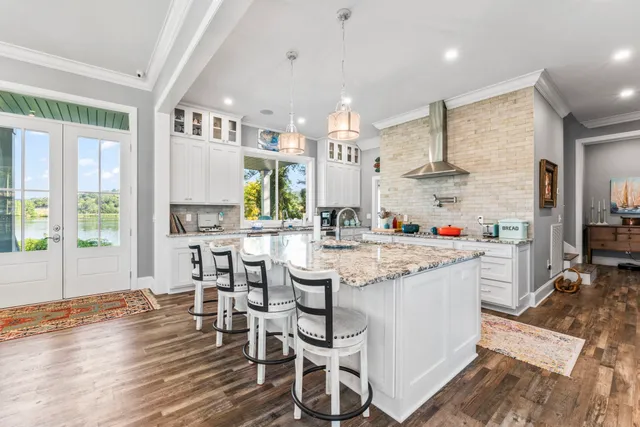 a bedroom with a bed and a view of en suite bathroom