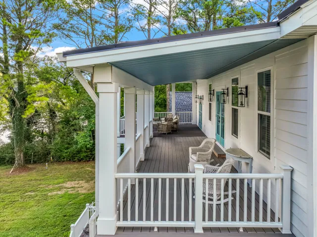 a bedroom with two beds and a window
