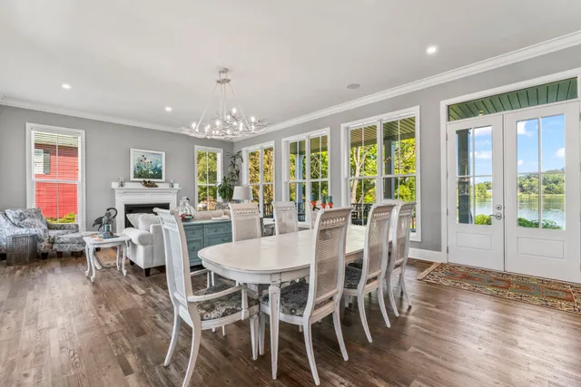 a kitchen with stainless steel appliances kitchen island granite countertop a sink and cabinets