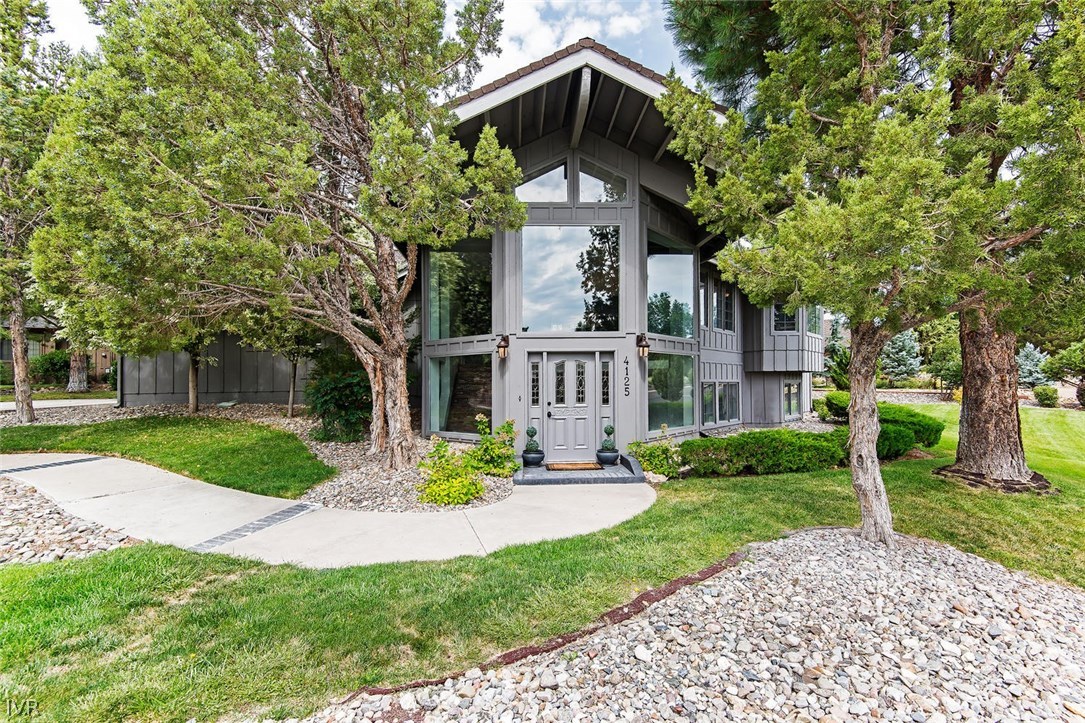 4125 Powderkeg Circle Reno, NV 89519 - Photo 1 of 11 a front view of a house with garden