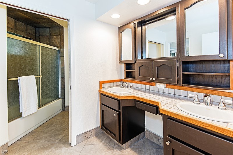 4125 Powderkeg Circle Reno, NV 89519 - Photo 6 of 11 a kitchen with a sink and a refrigerator