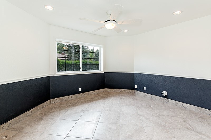 4125 Powderkeg Circle Reno, NV 89519 - Photo 7 of 11 a bedroom with a bed and a window