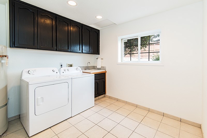 4125 Powderkeg Circle Reno, NV 89519 - Photo 9 of 11 a utility room with dryer and washer