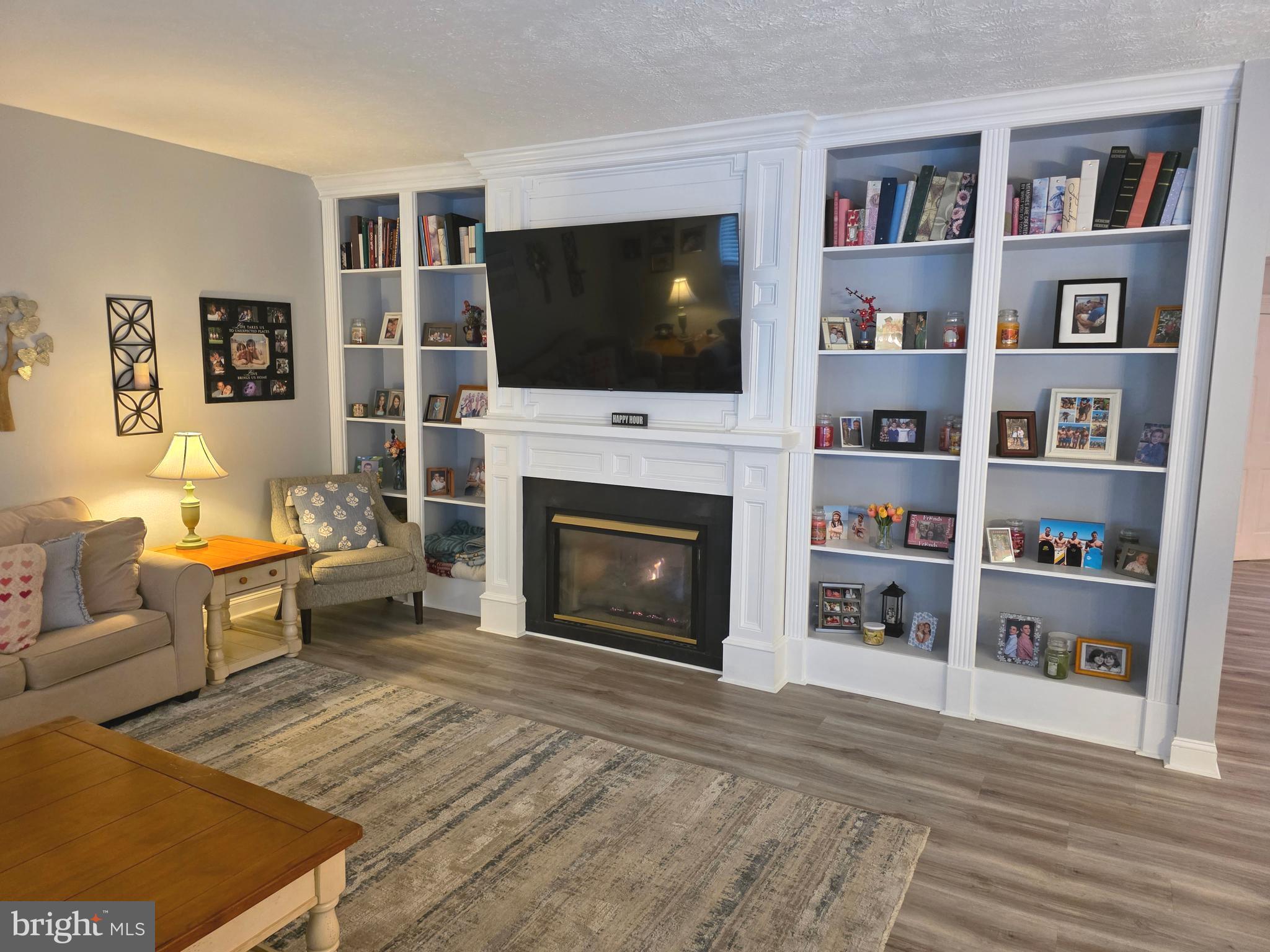 2441 Kemper Road Crofton, MD 21114 - Photo 28 of 63 a living room with furniture and a flat screen tv
