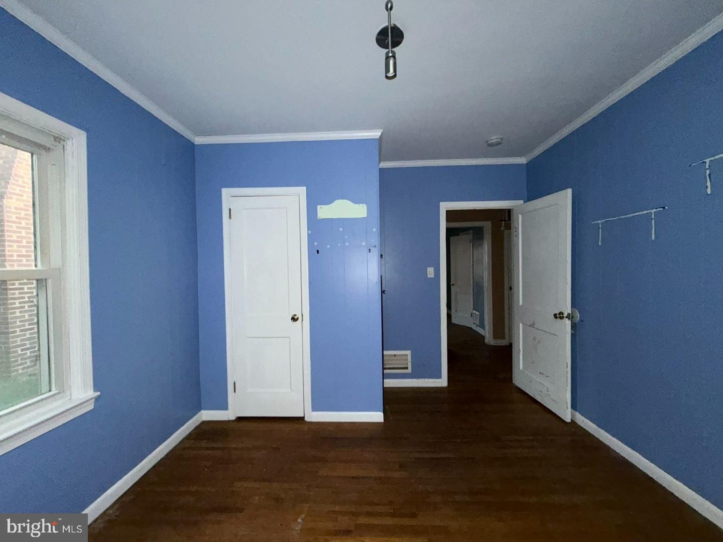 27 Haines Avenue Rising Sun, MD 21911 - Photo 11 of 32 a view of an empty room with wooden floor and a window