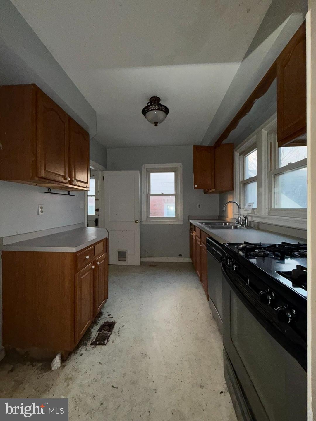 27 Haines Avenue Rising Sun, MD 21911 - Photo 16 of 32 a kitchen with stainless steel appliances granite countertop a stove a sink and a microwave