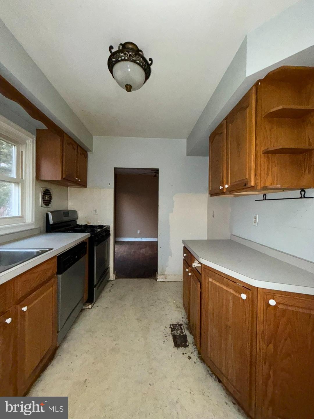 27 Haines Avenue Rising Sun, MD 21911 - Photo 17 of 32 a kitchen with granite countertop a sink a counter space and cabinets