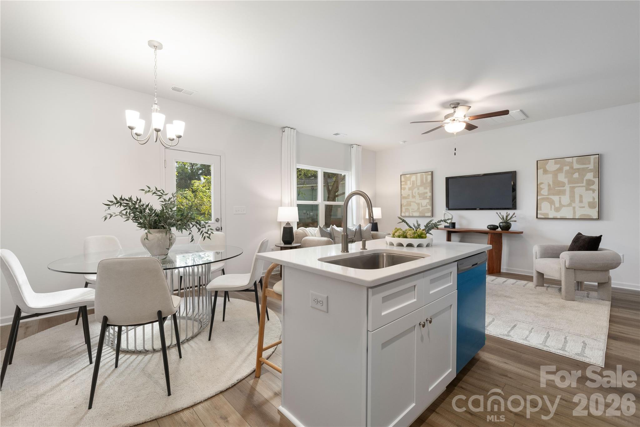 6924 Ridge Ln Road Charlotte, NC 28262 - Photo 12 of 24 a view of a dining room with furniture and chandelier