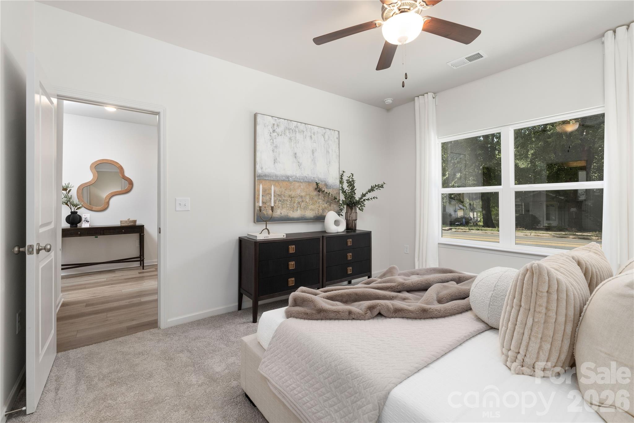 6924 Ridge Ln Road Charlotte, NC 28262 - Photo 17 of 24 a bedroom with a bed and window