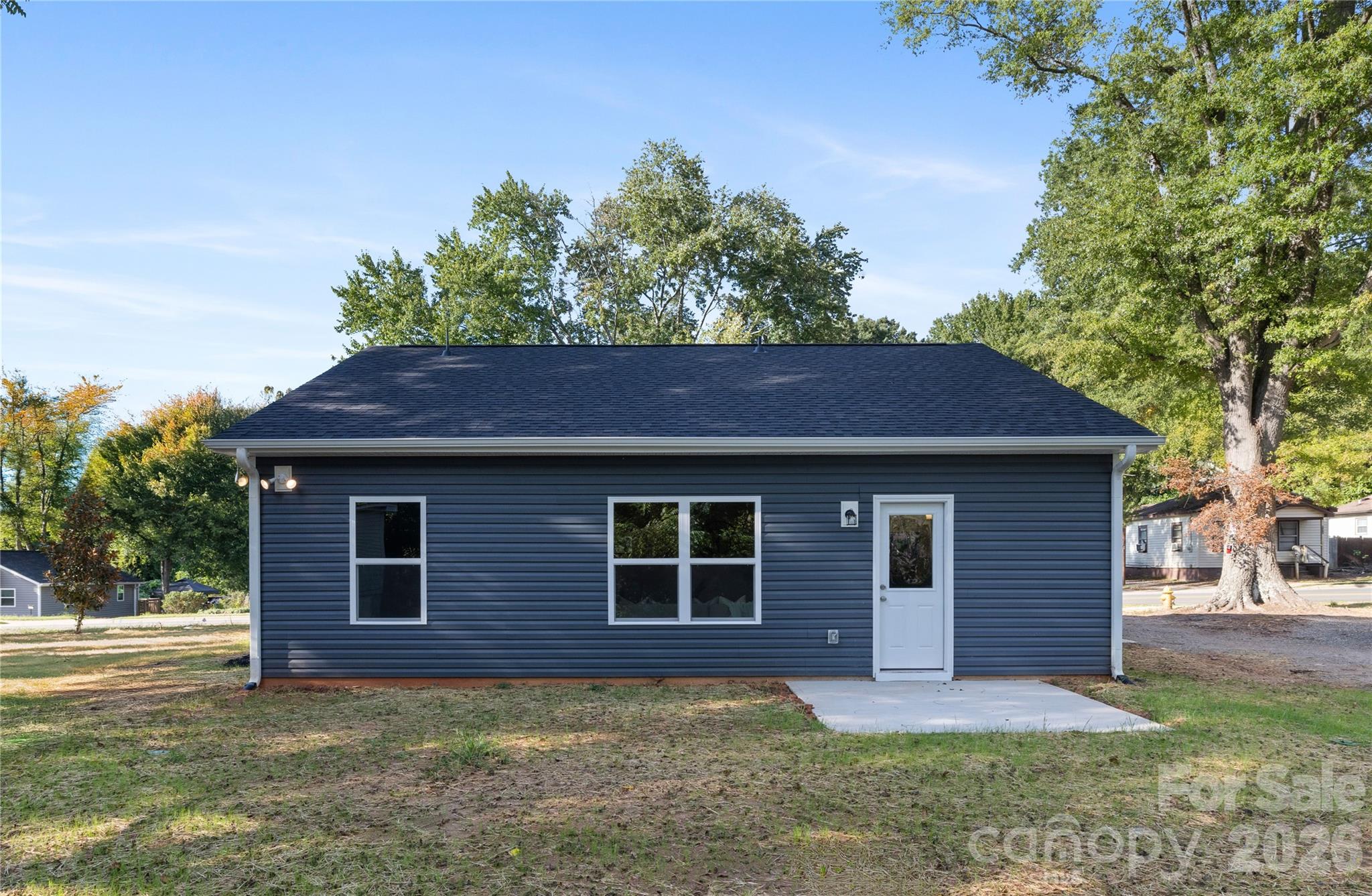 6924 Ridge Ln Road Charlotte, NC 28262 - Photo 22 of 24 a front view of a house with garden