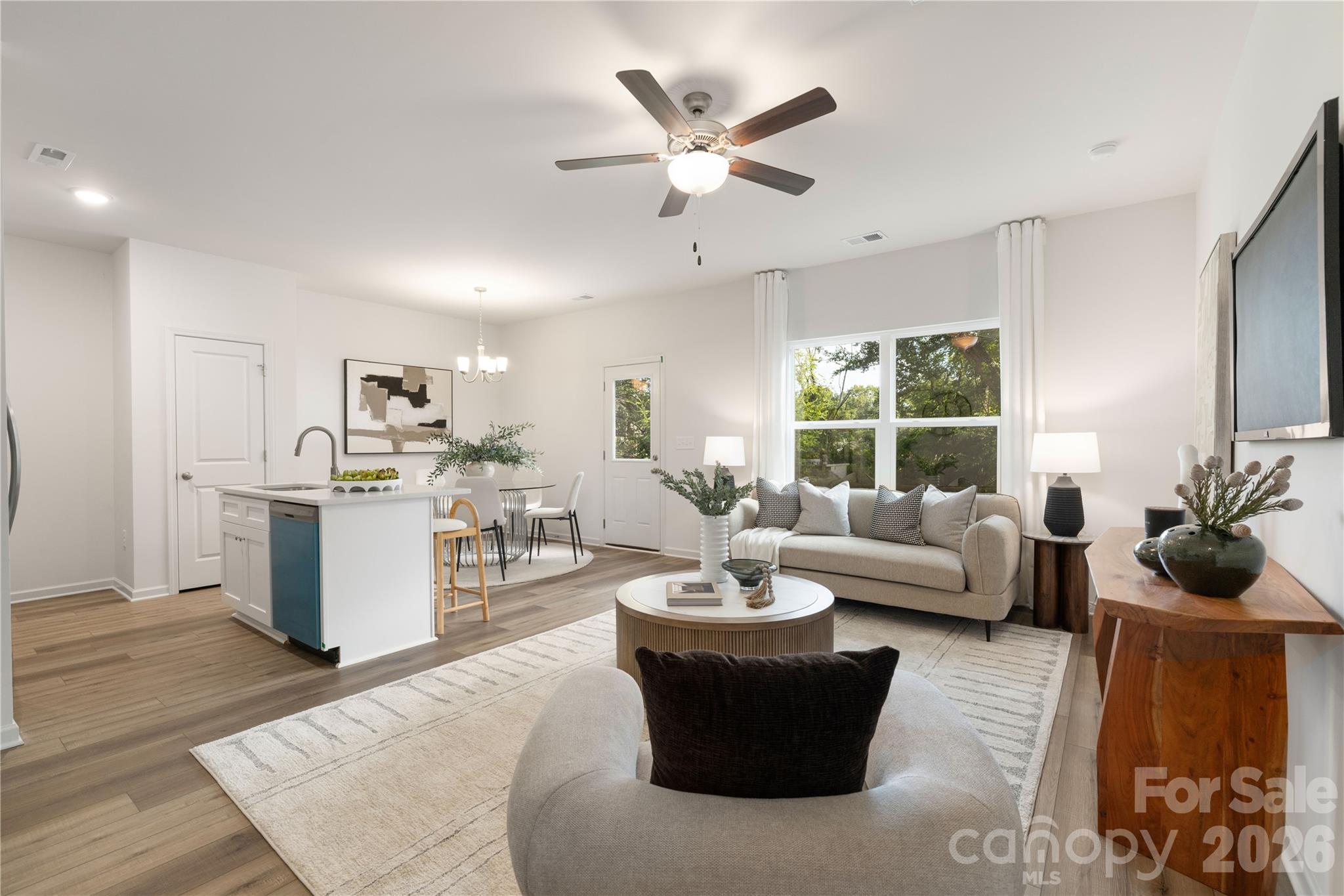 6924 Ridge Ln Road Charlotte, NC 28262 - Photo 6 of 24 a living room with furniture and view of kitchen