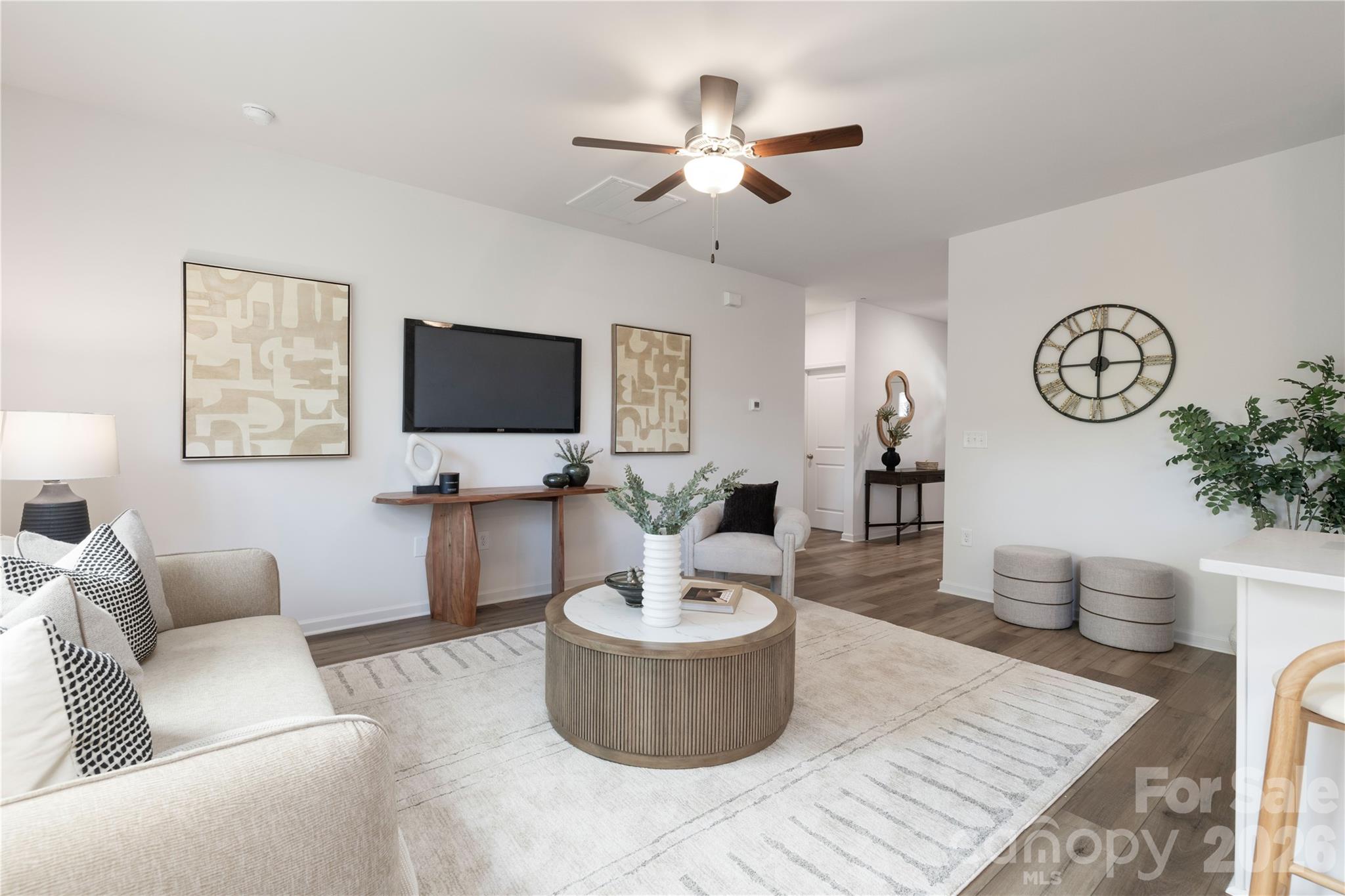 6924 Ridge Ln Road Charlotte, NC 28262 - Photo 8 of 24 a living room with furniture and a flat screen tv