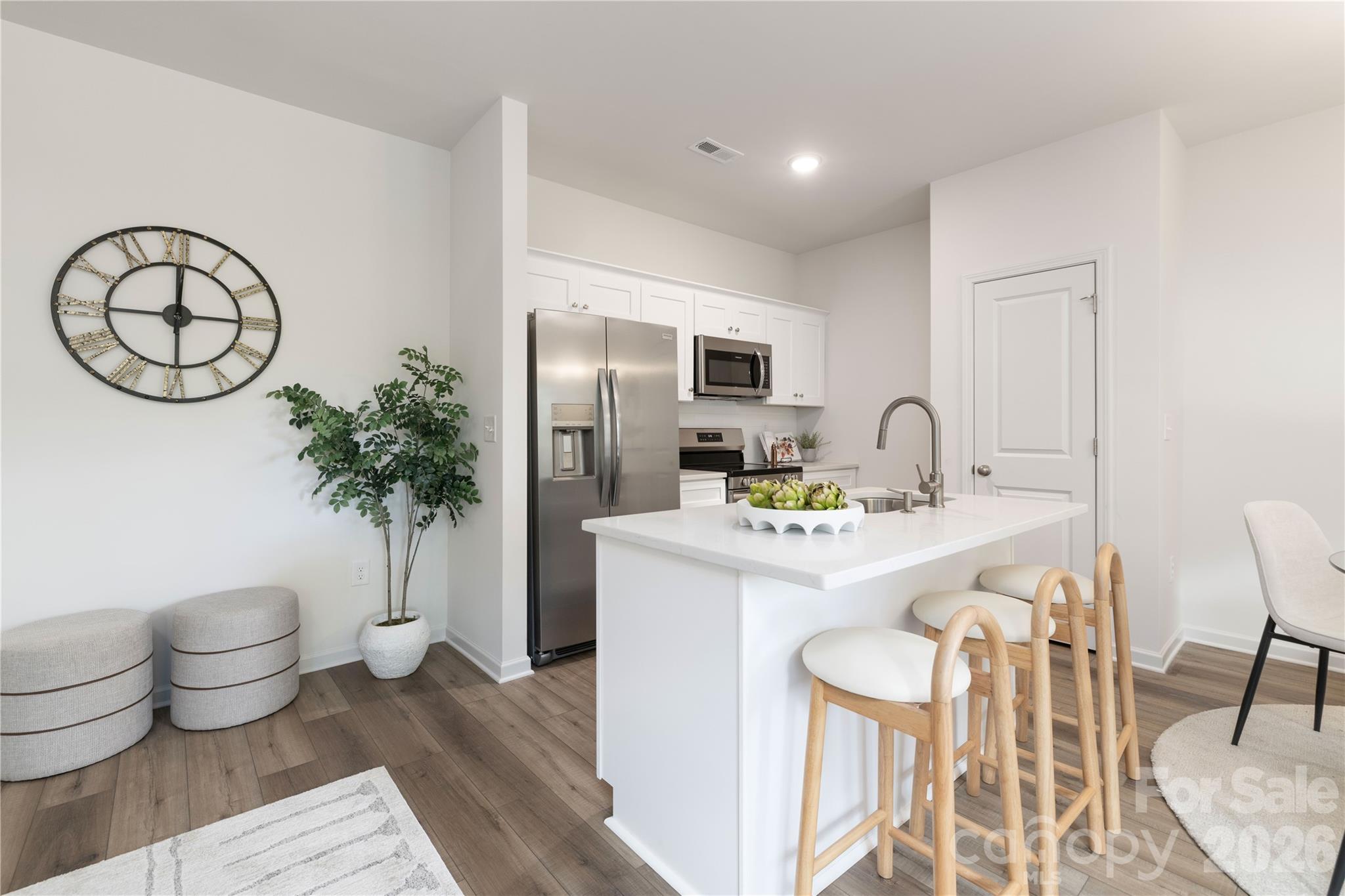 6924 Ridge Ln Road Charlotte, NC 28262 - Photo 10 of 24 a kitchen that has a sink and a stove