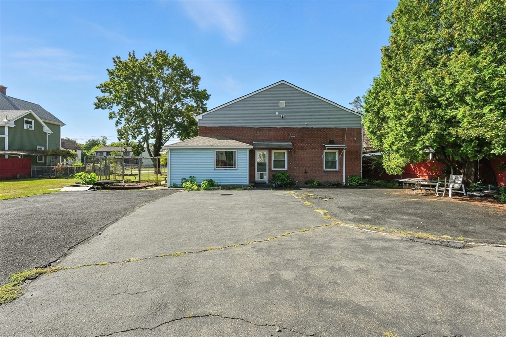 222-224 Main Street Springfield, MA 01151 - Photo 2 of 42 a front view of a house with a yard