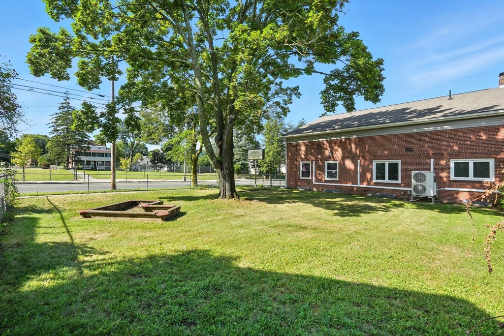 222-224 Main Street Springfield, MA 01151 - Photo 28 of 42 a view of a house with a big yard