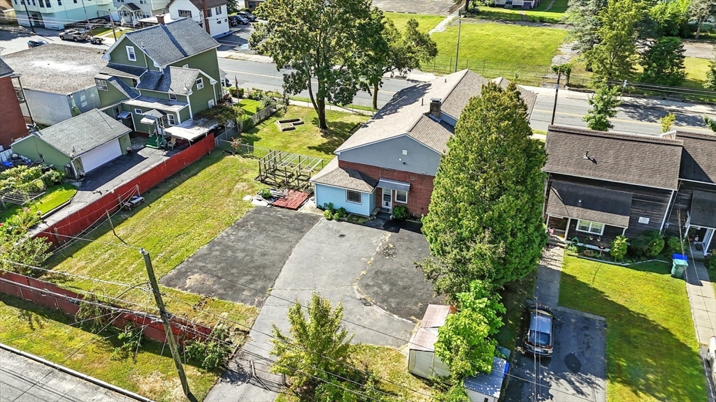 222-224 Main Street Springfield, MA 01151 - Photo 31 of 42 an aerial view of a house with a yard basket ball court and outdoor seating