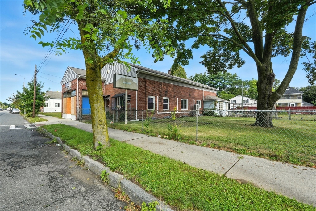 222-224 Main Street Springfield, MA 01151 - Photo 32 of 42 a view of house with a yard
